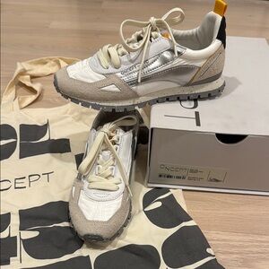 ONCEPT White and Silver Sneakers Toronto women’s size 7.  NWT